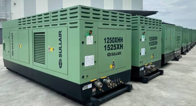 Lineup of Sullair high-pressure compressors